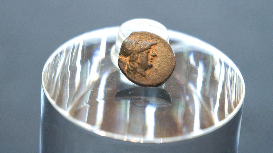 Teen stumbles on mysterious coin from legendary city, puzzling archaeologists over its journey Gold Coast Optometrists